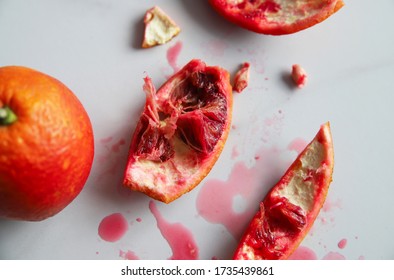 Blood Orange Peel On Light Marble Background. Tasty Red Citrus Fruit. Vitamin C Concept. Organic Food
