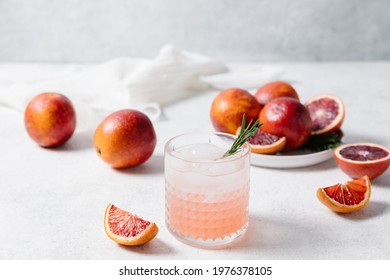 Blood Orange Vodka Soda Cocktail On White Table Background. Summer Cocktails, Lemonade, Refreshing Drinks, Cocktail Party Concept