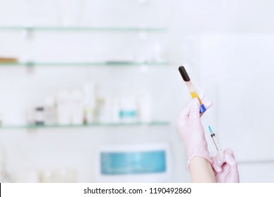 Blood Plasma For PRP Therapy And Syringe At The Doctor