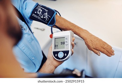 Blood pressure, hands and patient with nurse for checkup, wellness or assessment of heart rate in clinic. Medical exam, person or cardiologist in hospital to monitor pulse, hypertension or healthcare