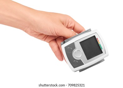 blood pressure measurement equipment tensiometer in hand isolated on white background - Shutterstock ID 709825321