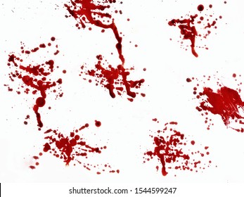 Blood Spilled On A White Paper Surface.