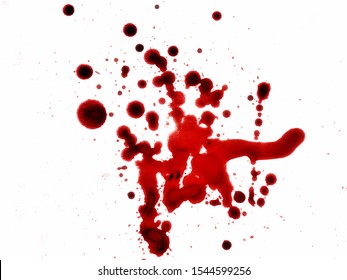 Blood Spilled On A White Paper Surface.