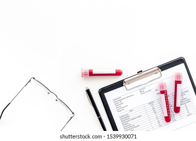 Blood Test Results On White Background Top View Copy Space