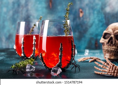 Bloody Halloween Party Cocktail Garnished With Thyme, Cranberry Punch