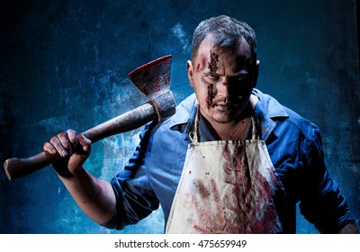 Bloody Halloween Theme: Crazy Killer As Butcher With An Ax