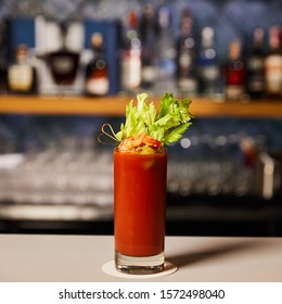 Bloody Mary Cocktail With Celery And Shrimp In Glass 