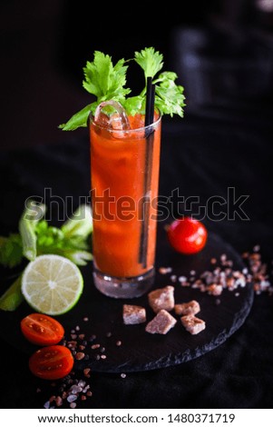 bloody mary cocktail with fresh tomatoes juice, salt & pepper