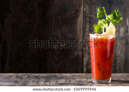 Bloody Mary cocktail in glass on white background.Copyspace