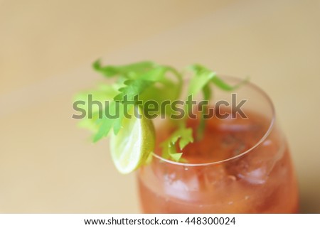 bloody mary cocktail on wooden background