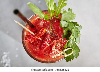 Bloody Mary Cocktail over Gray Background