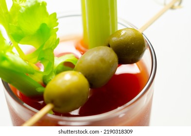 Bloody Mary Cocktail Prepared With Pure Vodka, Tomato Juice And Hot Pepper Sauce, Drink Decorated With Three Olives And Celery, Drink Hair Of The Dog