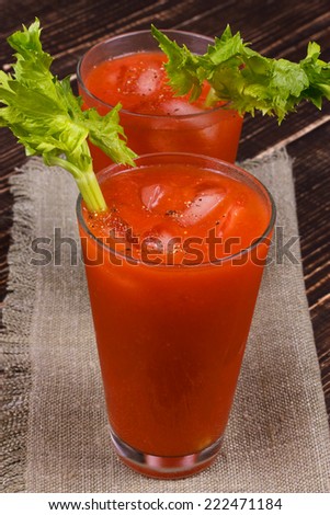Bloody mary cocktails  on wooden background