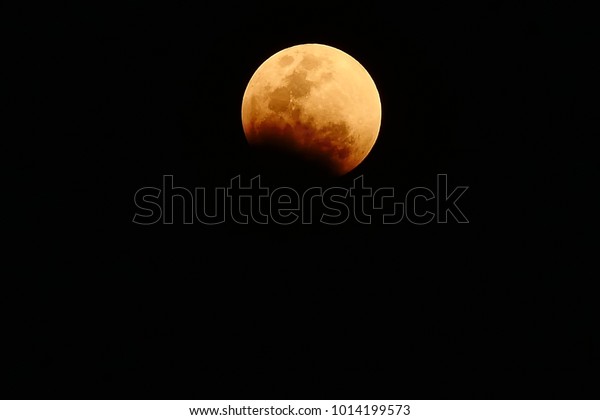bloody red moon, total Lunar eclipse as\
seen from Bangkok, Thailand. January 31,\
2018