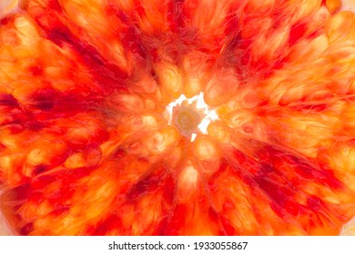 Bloody Red Sicilian Orange Pulp Texture Background. Macro Photo Of Red Orange Fruit. Citrus Friut Close Up