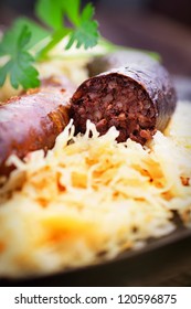 Bloody sausage and sauerkraut with potatoes. Traditional german oktoberfest dish.