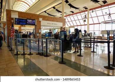 Bloomington, IL/USA-8/22/19: People Going Through TSA Security Screening A Busy International Airport.