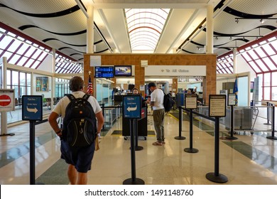 Bloomington,IL/USA-8/25/19: Person Going Through TSA Precheck Line And Regular Line Through Airport Security.