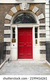 Bloomsbury Street View In West End Of London, UK. Architecture Detail - Beautiful Red Georgian Front Door.