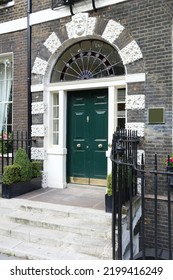 Bloomsbury View In West End Of London, UK. Architecture Detail - Beautiful Green Georgian Front Door.