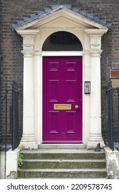 Bloomsbury In West End Of London, UK. Architecture Detail - Purple Georgian Style Front Door.