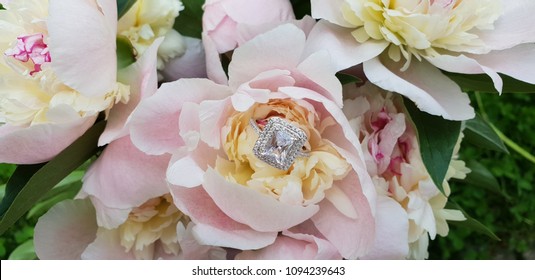 Blossoming peonies bouquet engagement ring