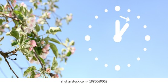 Blossoming Tree Branches With Digital Clock. Concept Of Time Change