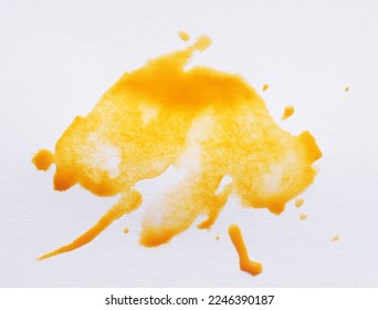 Blot of yellow ink on white background, top view - Shutterstock ID 2246390187