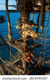 Blow out preventer array on on offshore oil drilling platform in the Gulf of America.