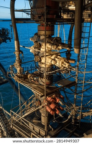 Blow out preventer array on on offshore oil drilling platform in the Gulf of America.
