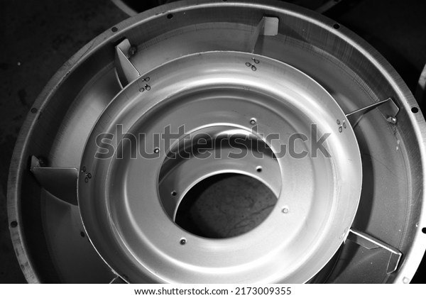 Blower Parts Produced
by Sheet Metal Stamping Tool Die, Welded and assembled.
Black-and-white photo.