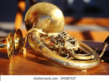 Blowing Brass Wind Instrument On Table