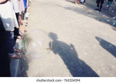 Blowing Bubbles in the Park