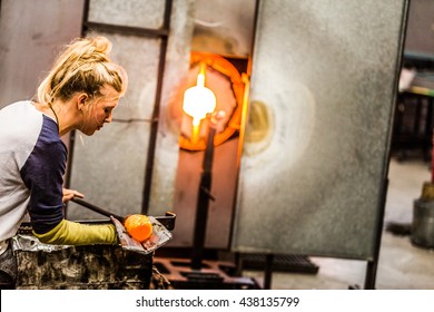 Blowing Glass Professional Caucasian Woman Working on a Vase.