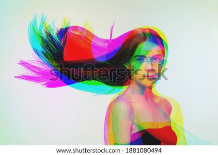 Blowing. Multiple portrait with glitch duotone effect. Multiple exposure, abstract fashionable beauty photo. Young beautiful female model posing. Youth culture, composite image, fashionable people.