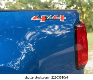 A Blue 4x4 Pickup Truck Rear End And Wheelwell