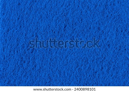 Blue abrasive sponge texture background