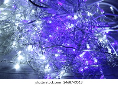 Blue abstract technical cable background with blue and purple lights, modern technological electrical high tech background
