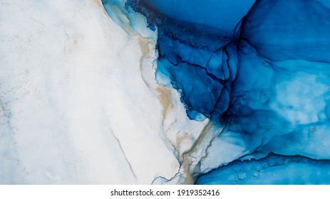 Blue alcohol stains paint and the addition gold powder  Subtle waves paint  abstract blue waves the ocean  lines marble  Liquid paints  gradient stains  painting 