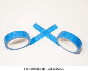 Blue all purpose decorators painters tape also used for crafts and woodworking isolated on a white background - Powered by Shutterstock