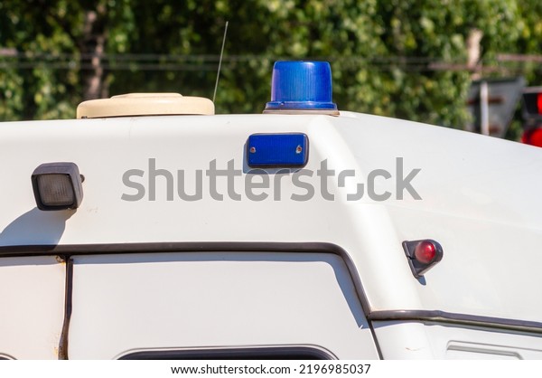 blue\
ambulance flashing light. High quality\
photo
