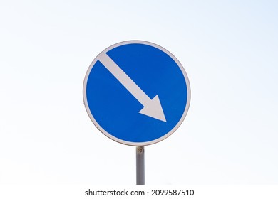 Blue Arrow Sign Showing The Way. Indicator Sign. Finding The Way. Road Sign Indicating The Direction.