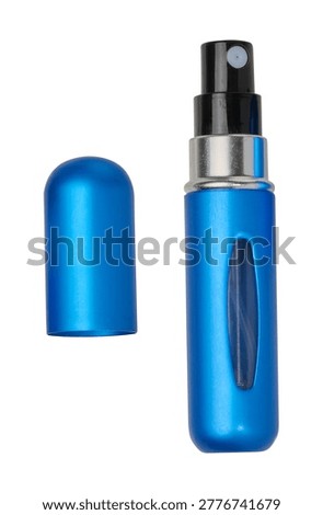 Blue atomizer, perfume bottle, and cap. Metal case with a window, travel size, isolated background.