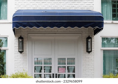 blue awning roof over the building door. blue canvas roof at the coffee shop. - Powered by Shutterstock