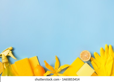 Blue Background With Cleaning Supplies And Lemons, Bright Background With Copy Space