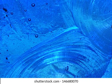 Blue Background: Closeup Of Abstract Design In A Piece Of Chipped Slab Glass In A Stained Glass Window