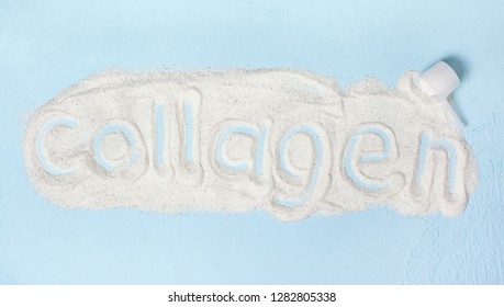 blue background with collagen powder close up - Shutterstock ID 1282805338