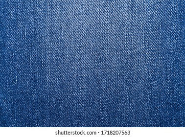 Blue background, denim jeans background. Jeans texture, denim fabric.
