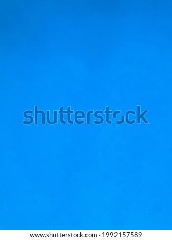 Blue background with gradient texture. Blank blue wall simple