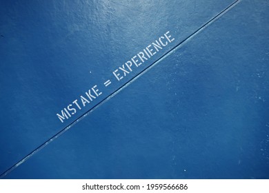 Blue Background With Line And Text Inscription MISTAKE = EXPERIENCE , Concept Of Daring To Do New Things Out Of Comfort Zone , Turning Mistakes Or Error  Into Positive Learning Experiences